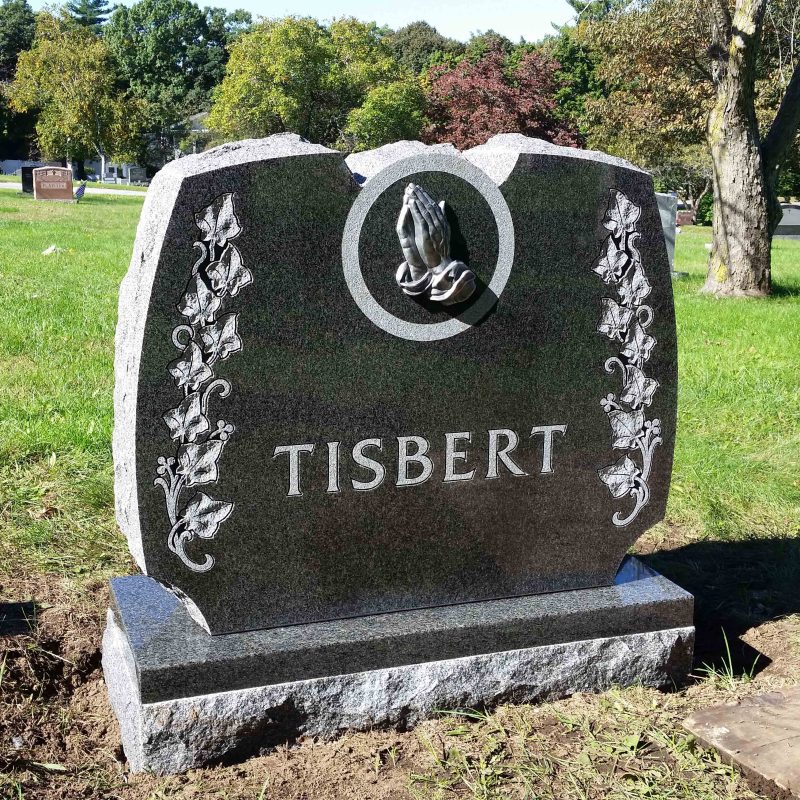 Tisbert Black Granite Headstone with Ivy Leaves and Praying Hands Sculpture