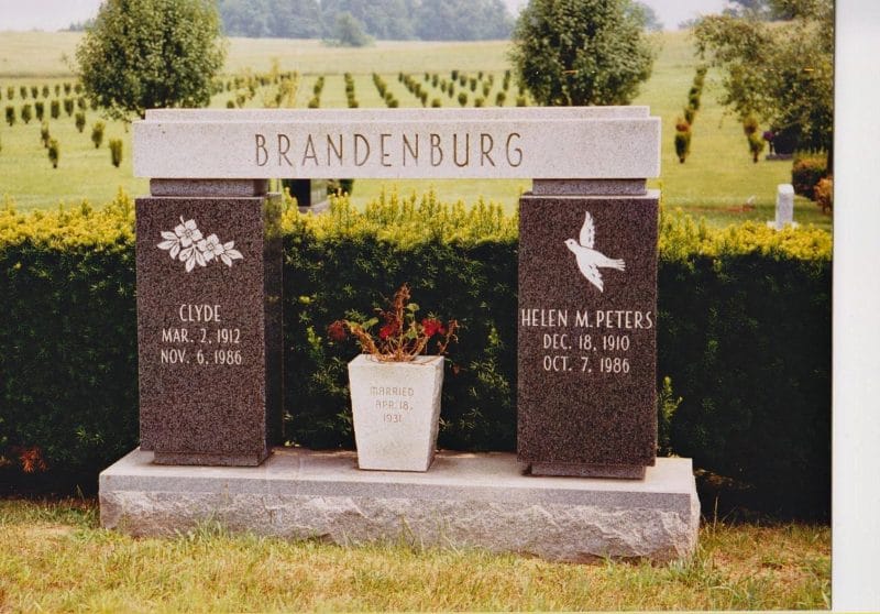 Brindle Sacred Heart Carving with Two Gray Granite Vases